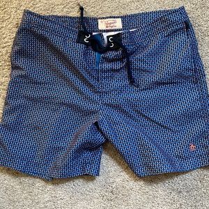 Original Penguin swim trunks.